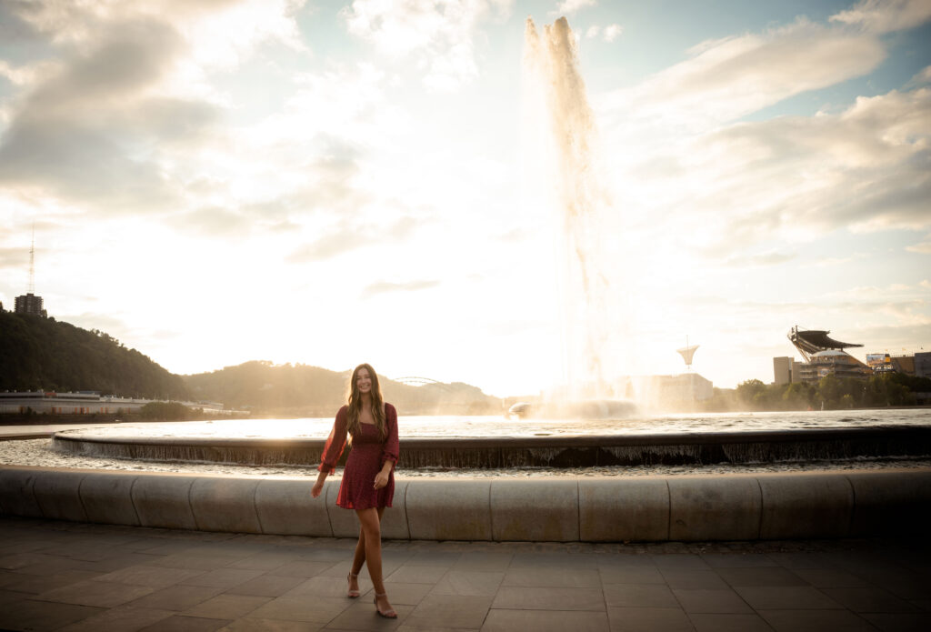 Senior in front of Fountain at Point State Park during Sunset in Pittsburgh