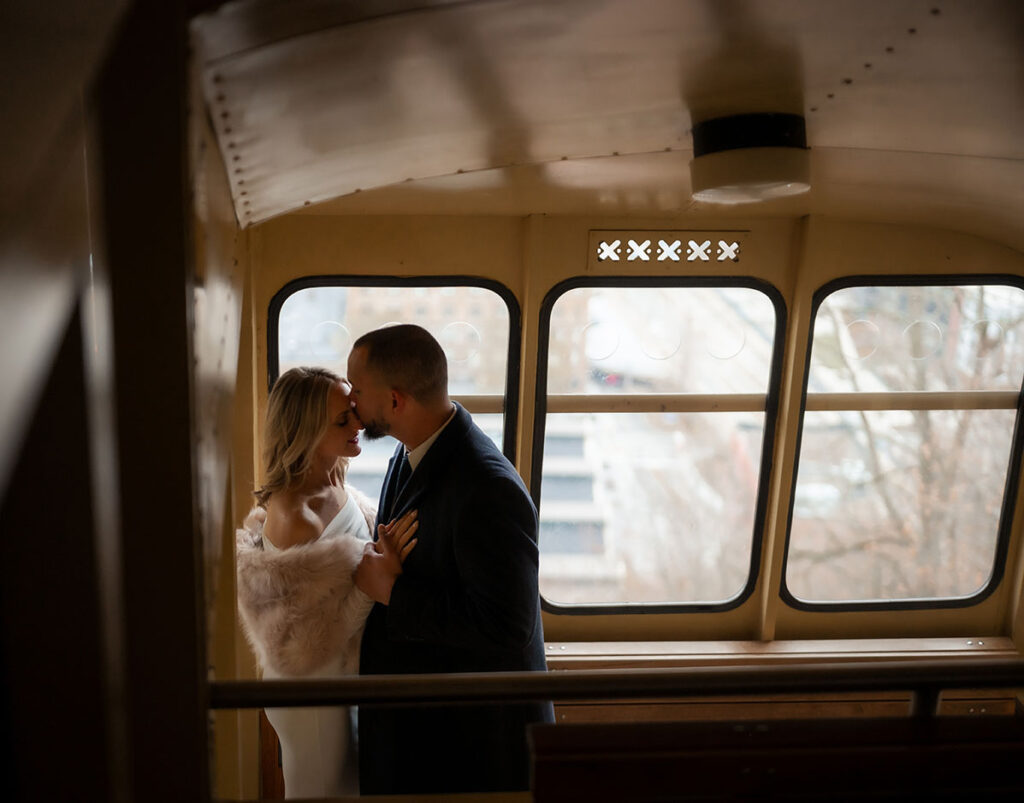 Groom Kisses Bride at Duquesne incline in Pittsburgh