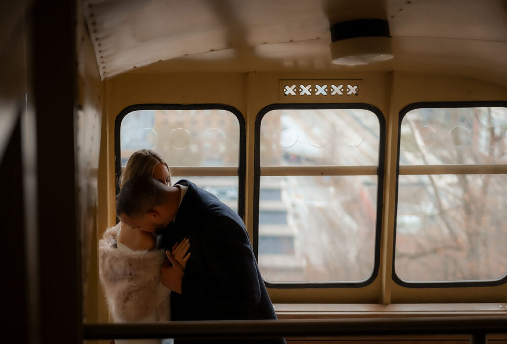 Groom Kisses Bride's Shoulder at Duquesne incline