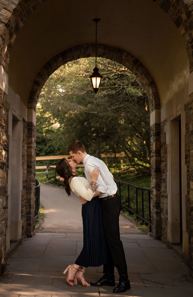 Couple Kiss during their engagement at Frick Park in Pittsburgh