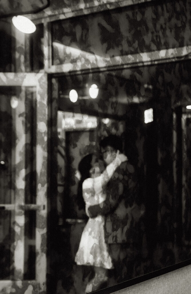 BW Couple Embracing Each other at the Oaklander Lobby in Pittsburgh