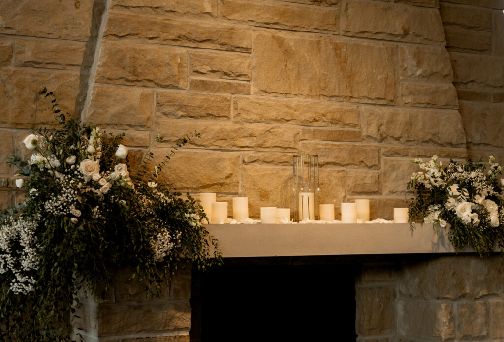 Candle Lights against a brick wall of the National Aviary Wedding