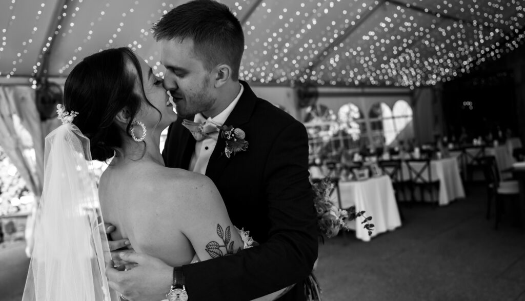 Couple kiss at Phipps Conservatory and Botanical Gardens 