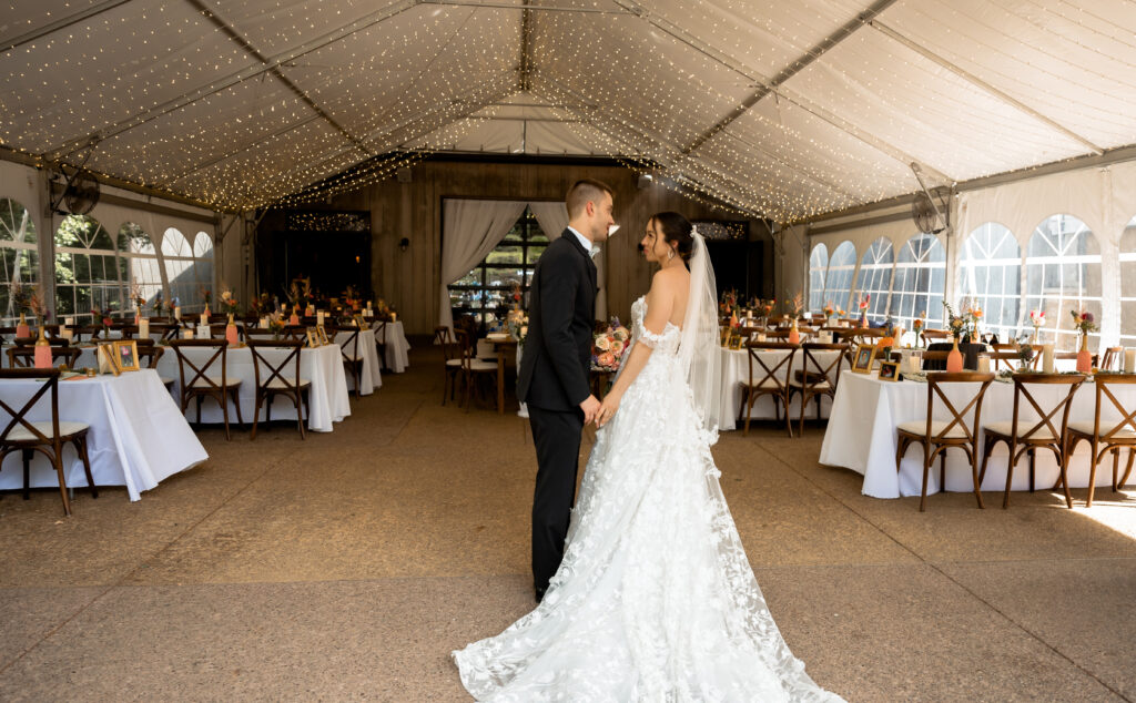 Couple stand in front of empty tables at Phipps Conservatory and Botanical Gardens 