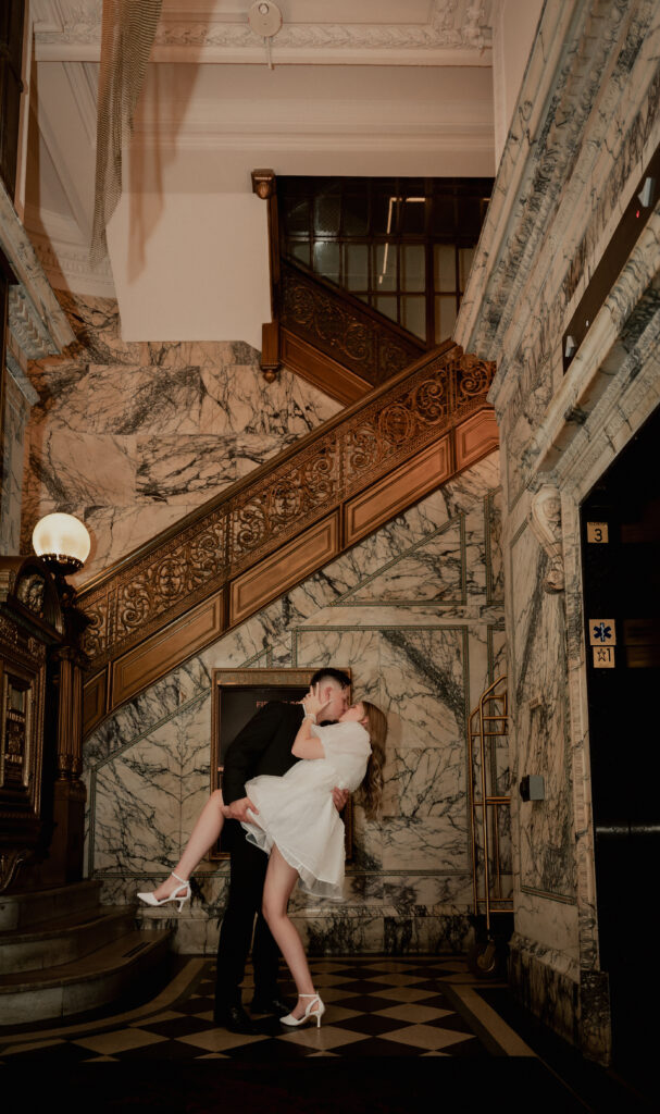 Couple dipping at the main lobby of The Industrialist Hotel, Pittsburgh, Autograph Collection