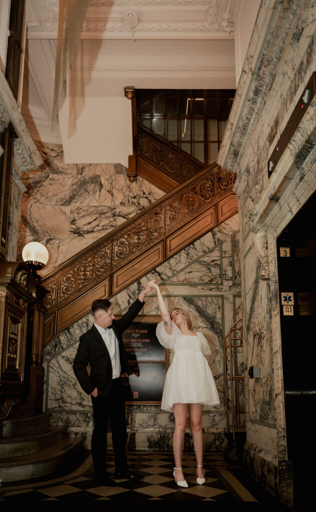 Bride and Groom dancing at the main lobby of The Industrialist Hotel, Pittsburgh, Autograph Collection