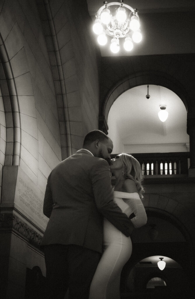 Romantic Black and White Couple kissing after their wedding at the Allegheny Courthouse
