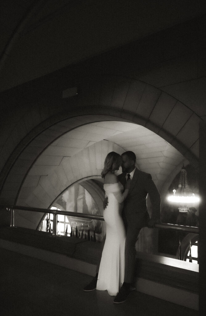 Romantic Black and White Couple holding each other after their wedding at the Allegheny Courthouse