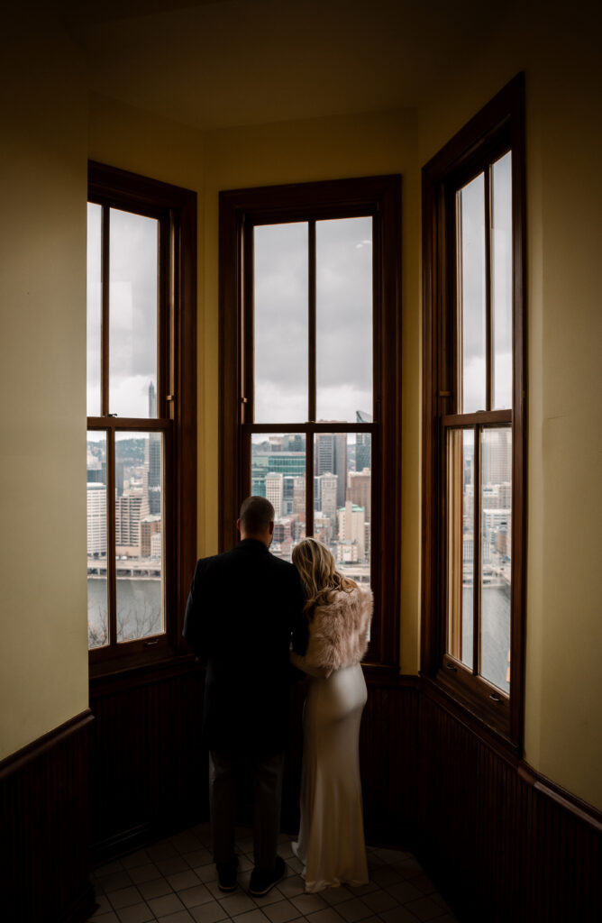 Bride and Groom looking at the city from The Monongahela Incline