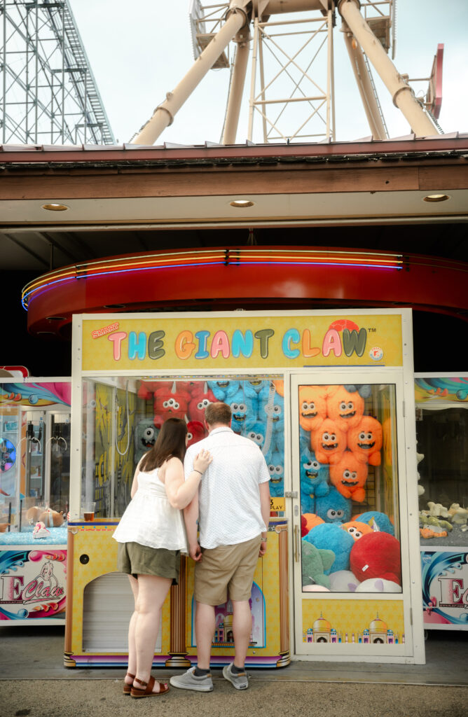 Couple Holding as they play at Kennywood Park
