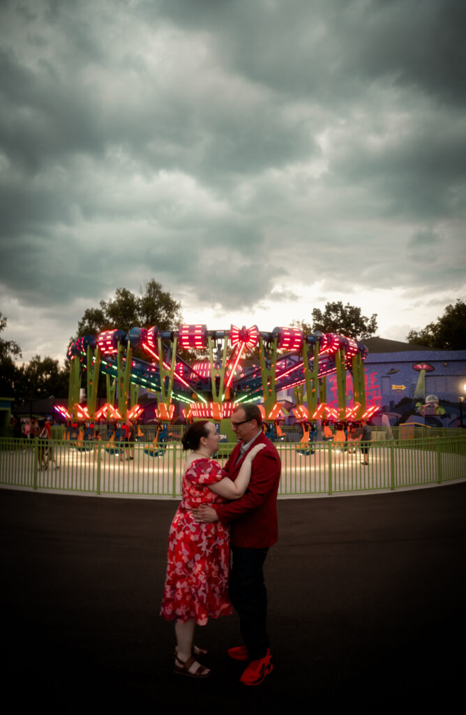 Couple looking at each other in a fair in Kennywood