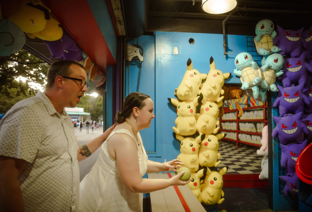 Couple play at a Pokemon fair in Kennywood