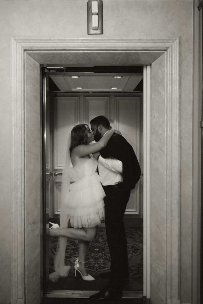 Bride and Groom kiss inside the elevator of the Omni Penn Hotel in Downtown Pittsburgh