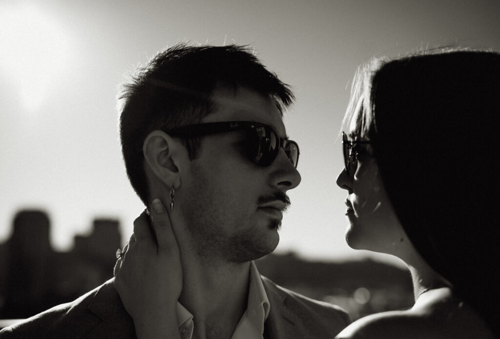 Couple look at each other in black and white
