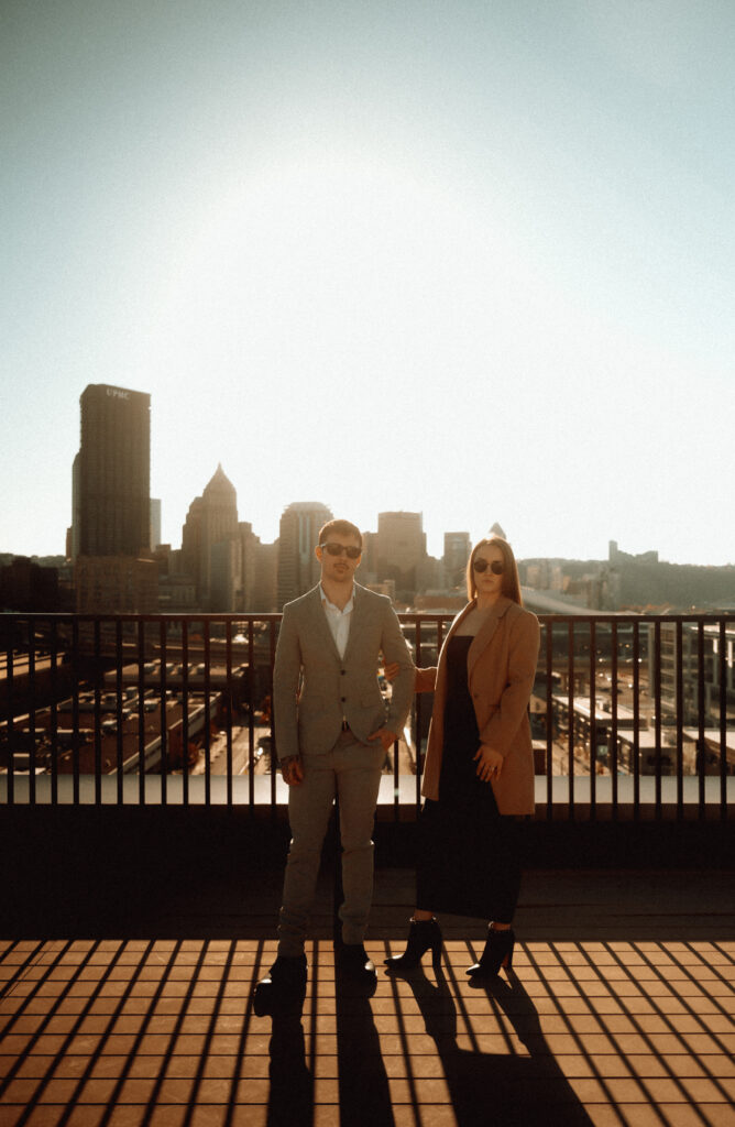 Couple Looking straight with Downtown Pittsburgh