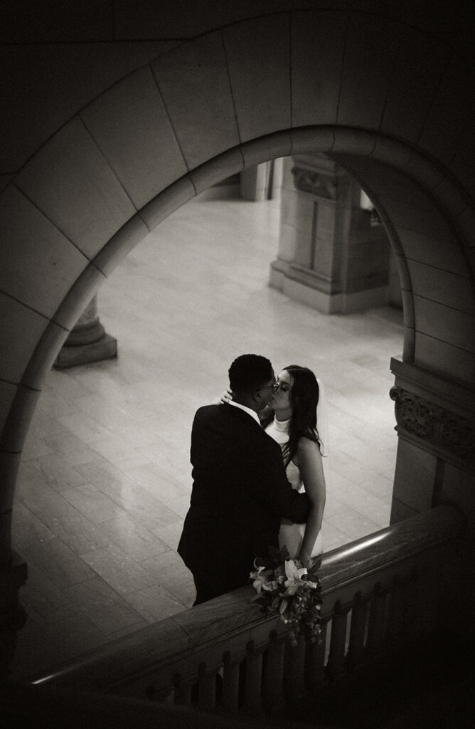 Couple kissing in the Allegheny Courthouse after their Elopement in Downtown Pittsburgh