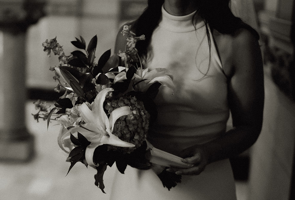 Bride holding her bouquet before her wedding in Downtown Pittsburgh Courthouse 