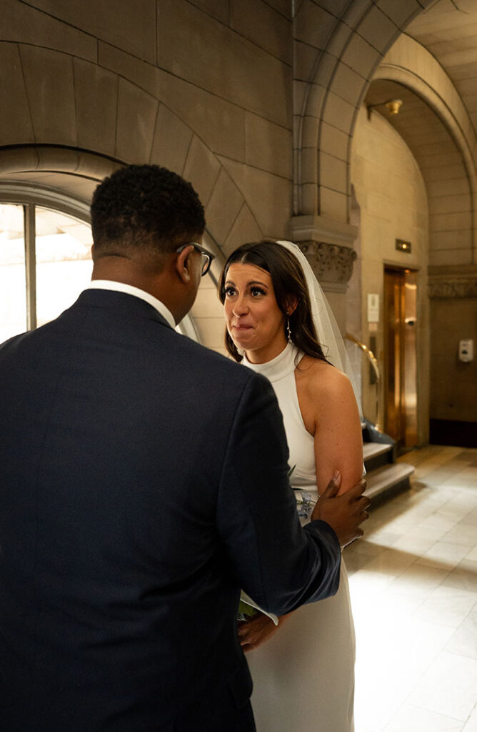 Bride and groom see each other at the Allegheny Courthouse before wedding