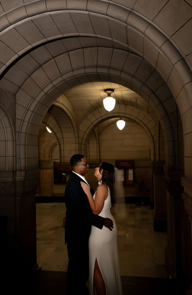 Bride and groom looking at each other at the Allegheny Courthouse in Pittsburgh