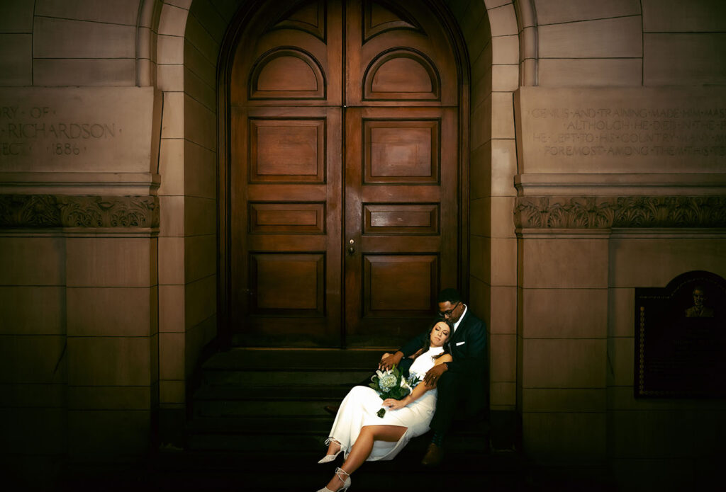 Bride and Groom holding each other at Allegheny Courthouse after their Elopement in Downtown Pittsburgh