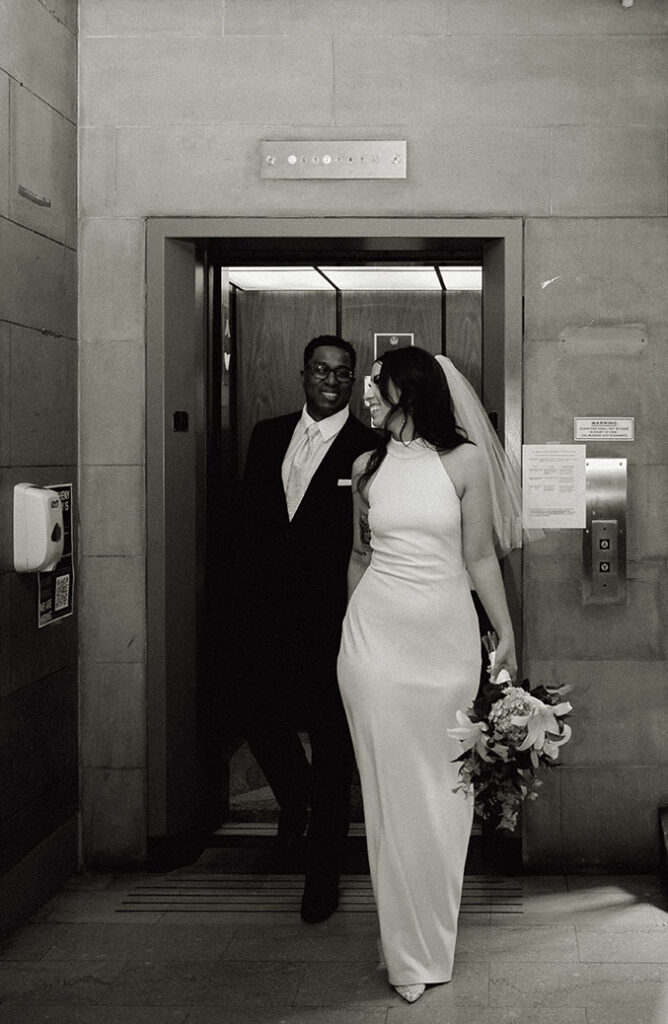 Bride and Groom exiting the elevator of the Allegheny Courthouse after their Elopement in Downtown Pittsburgh