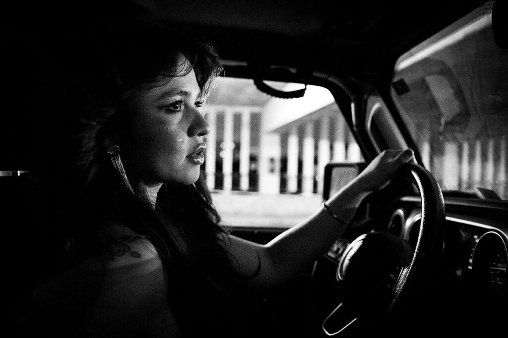 Sexy woman in a jeep driving