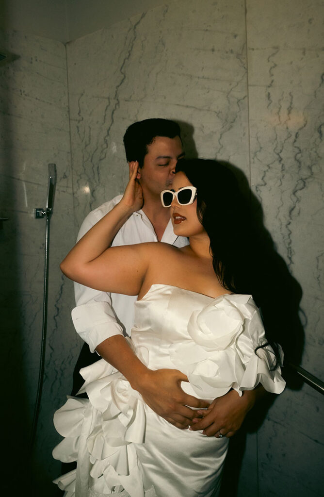 Bride and Groom at hotel room during their engagement