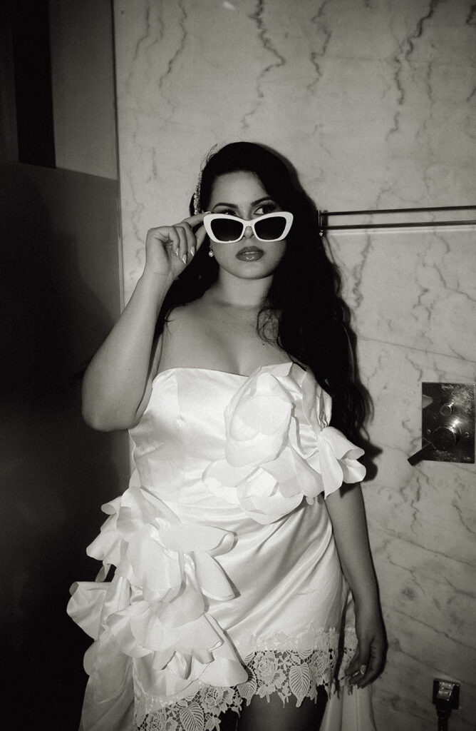 BW Bride in hotel bathroom before engagement