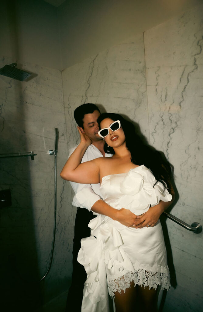 Couple embrace each other about to kiss in Hotel Engagement