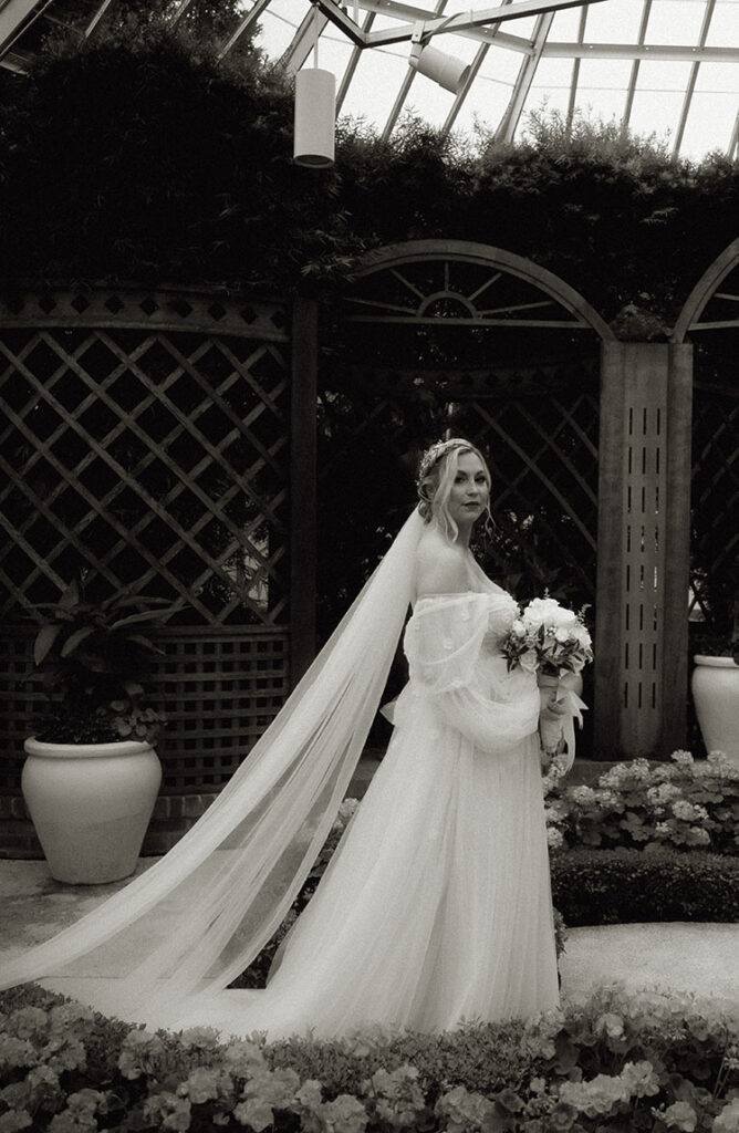 Bride stands in Phipps Conservatory Wedding at the Broderie Room 