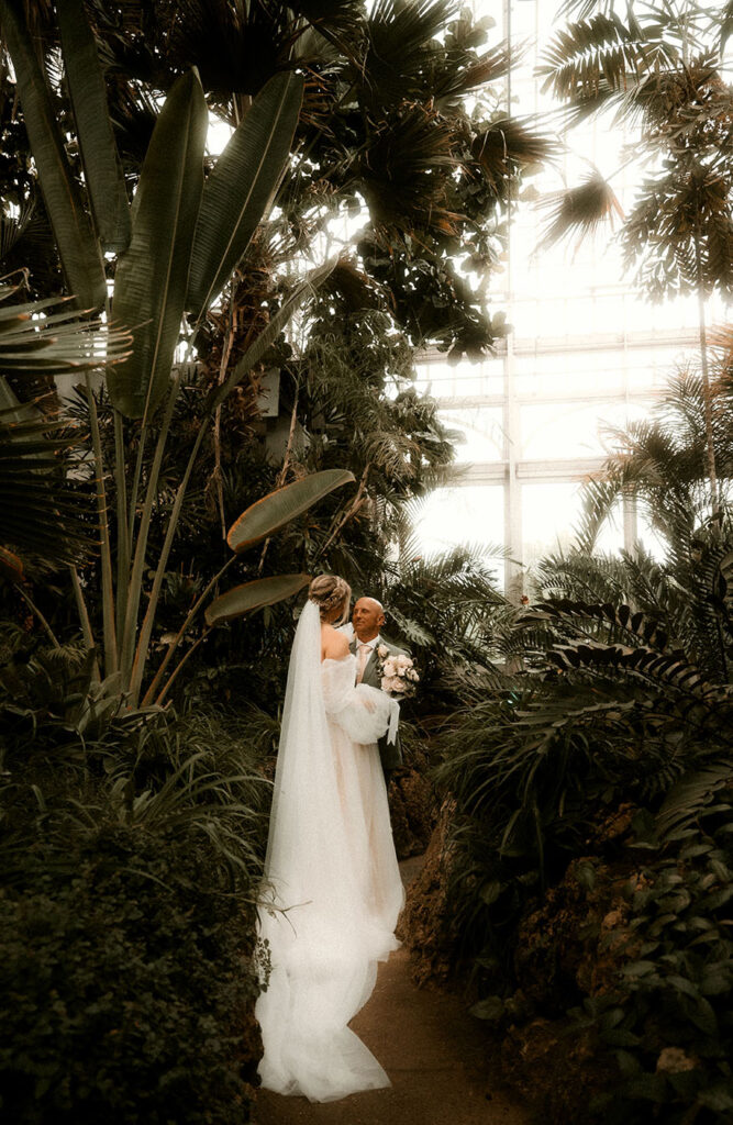 Bride and Groom Kiss at Phipps Conservatory and Botanical Gardens