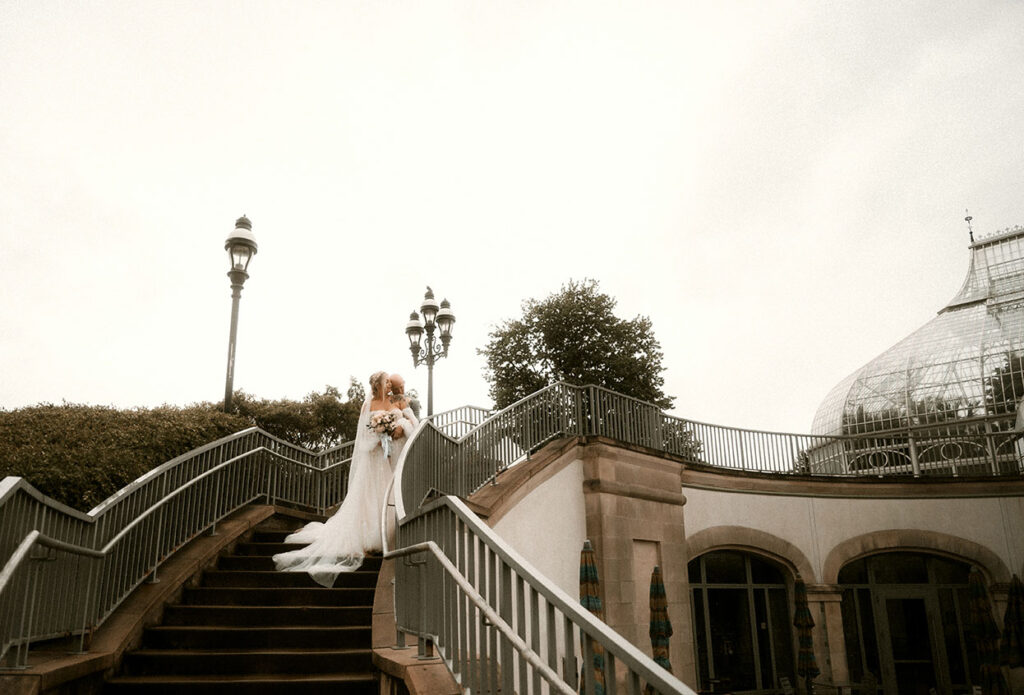 Bride and Groom embracing each other at Phipps Conservatory