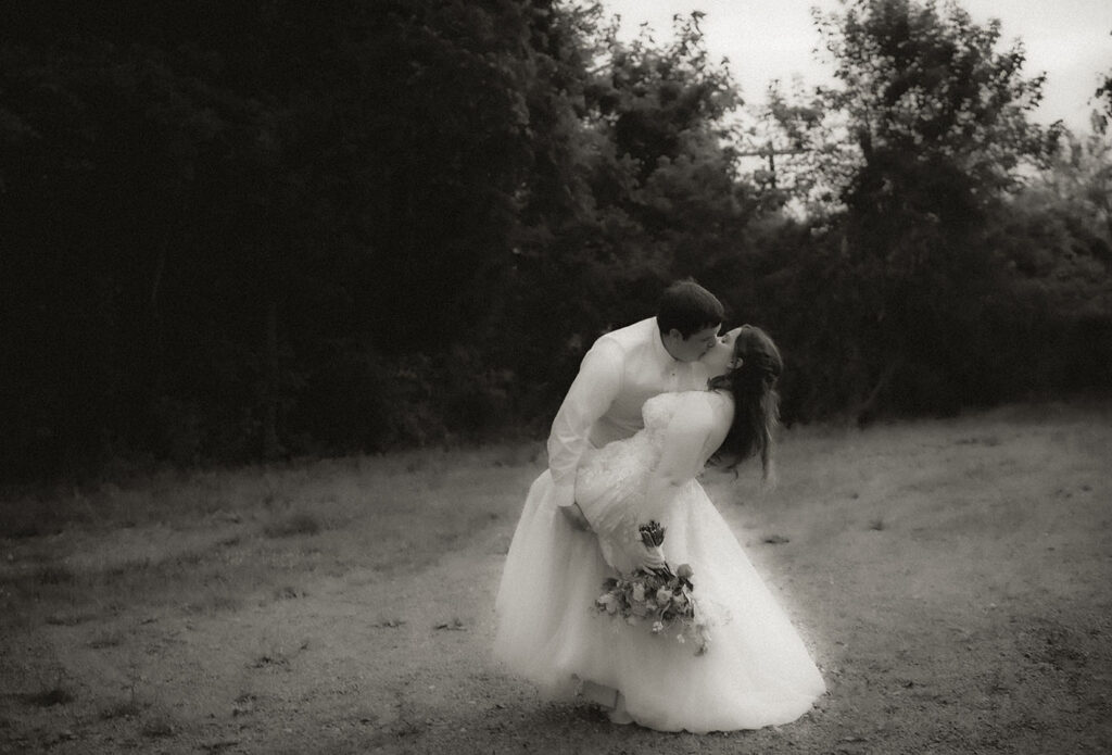 BW Bride and Groom kiss during golden hour