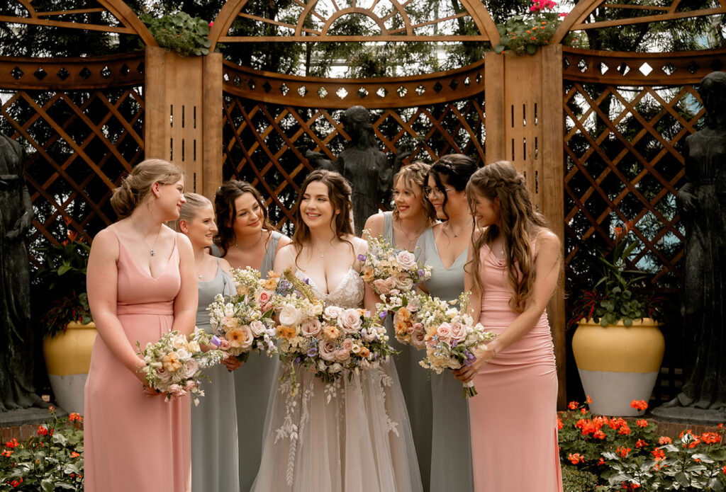 Bride with her bridesmaids after the ceremony at Phipps Conservatory 