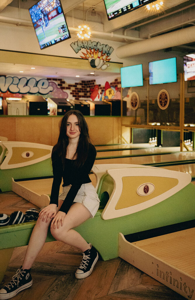 Senior sitting at bowling at Coop Deville in Pittsburgh