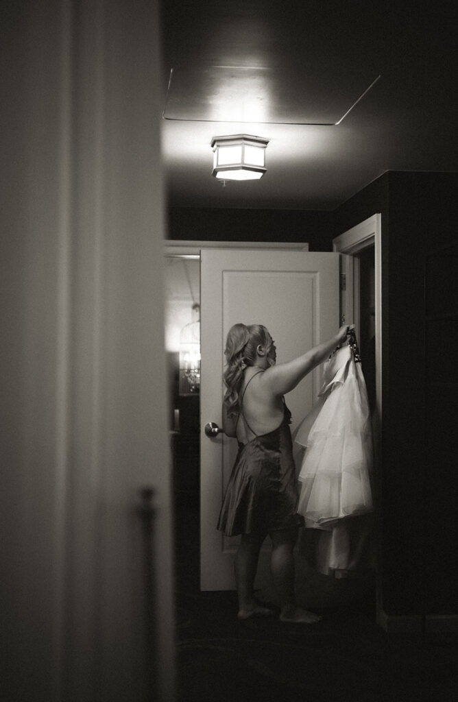 Bride looking at wedding gown at Hotel Monaco in Downtown Pittsburgh