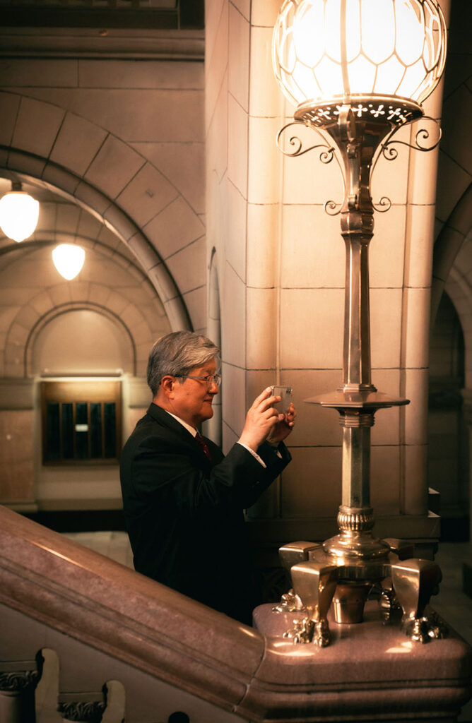 Father of groom takes a photo at Allegheny County Courthouse