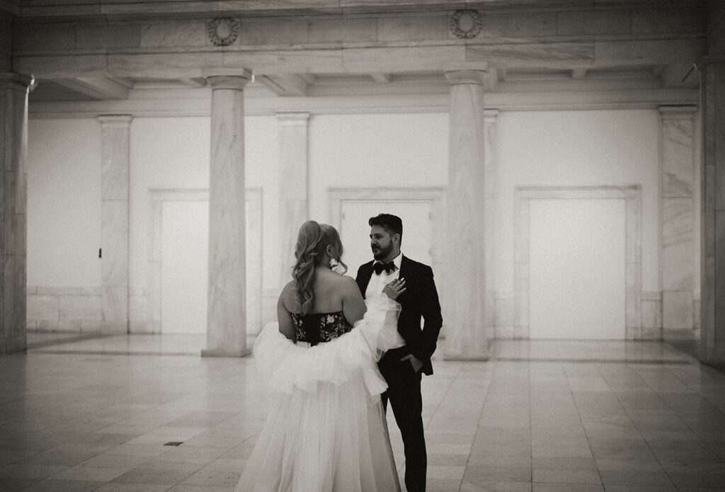 BW Bride and Groom Dancing at Carnegie museum of art Hall of Sculpture