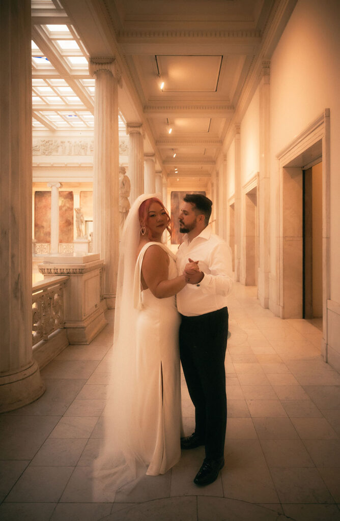 Bride and Groom at Carnegie museum of art Hall of Sculpture