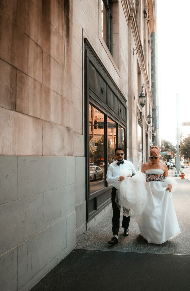 Bride and Groom walking in Downtown Pittsburgh before wedding