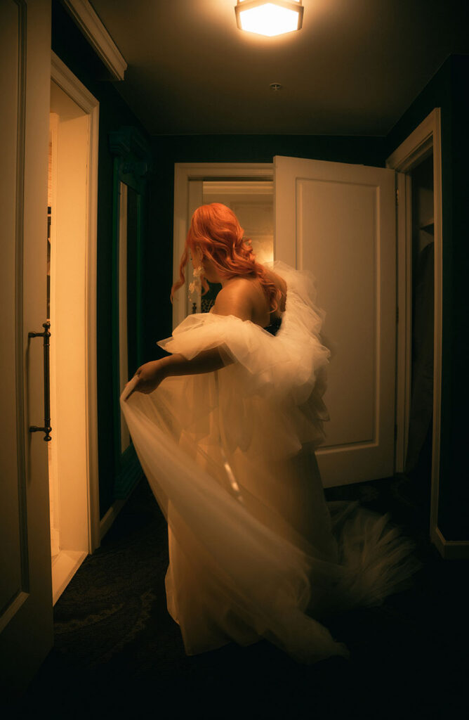 Bride Spinning after putting her wedding gown in Kimpton Hotel Monaco