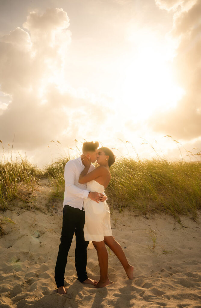 Couple kiss in South Point Beach