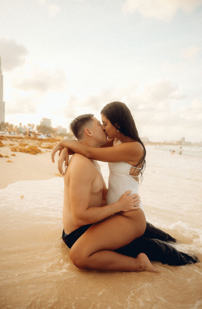 Couple kiss at beach shore