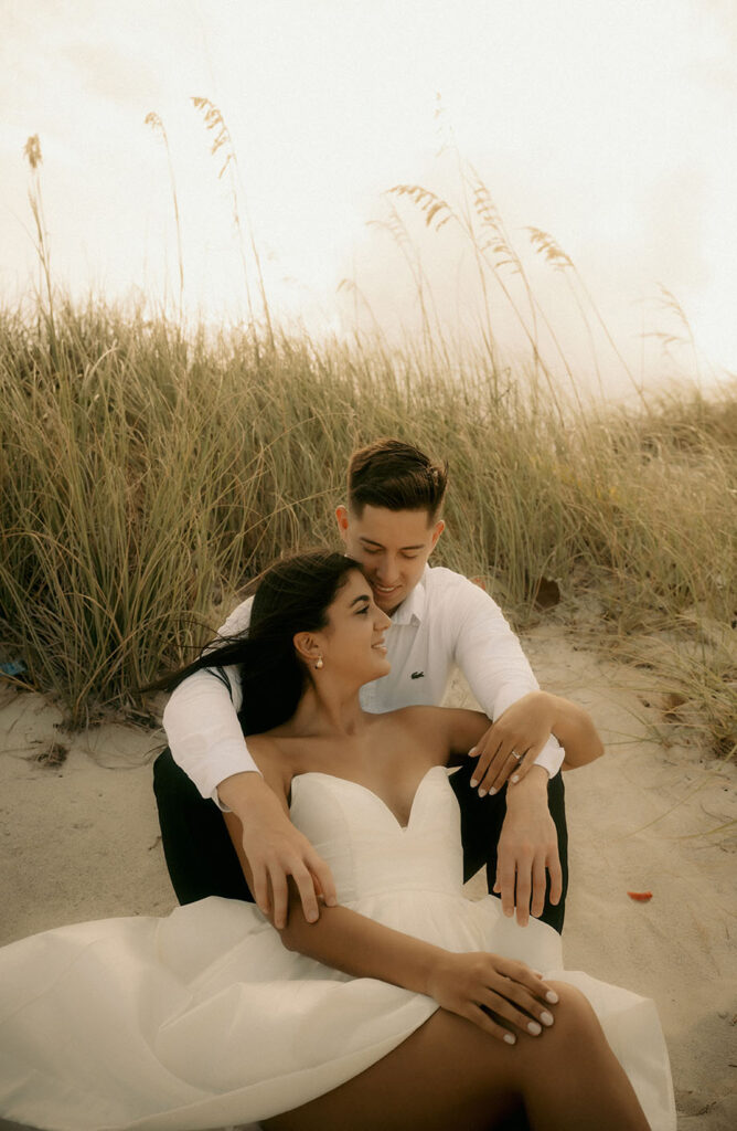 Couple laying on the beach