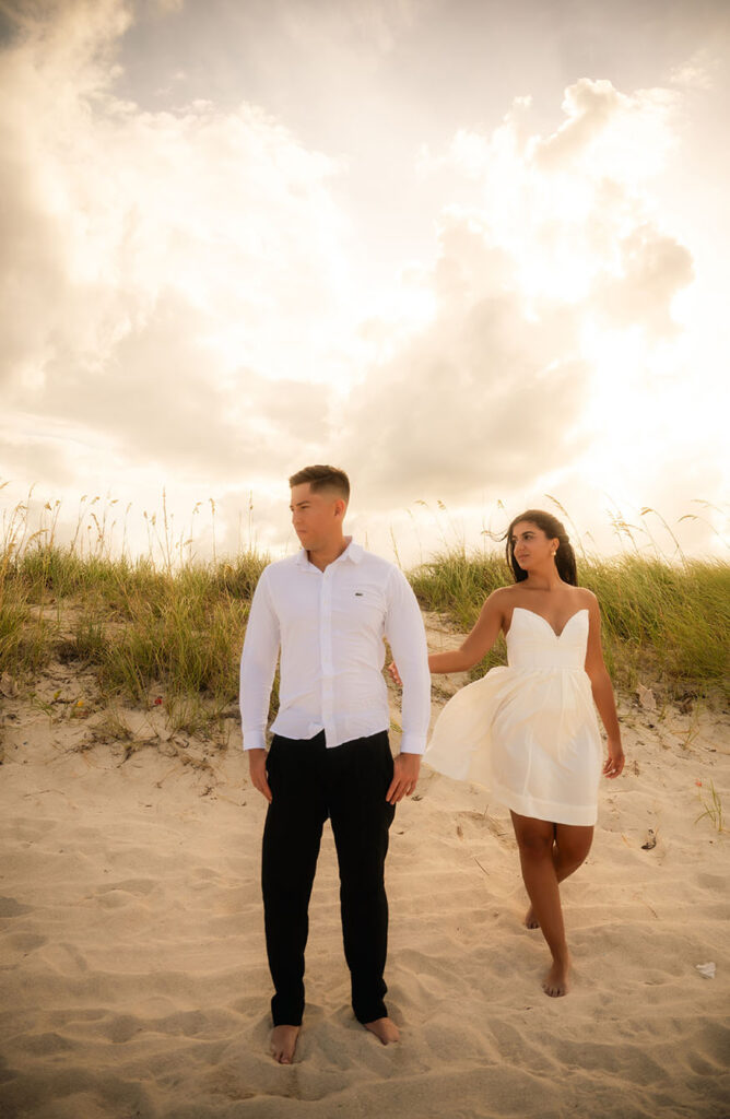 Couple walk down in South Beach