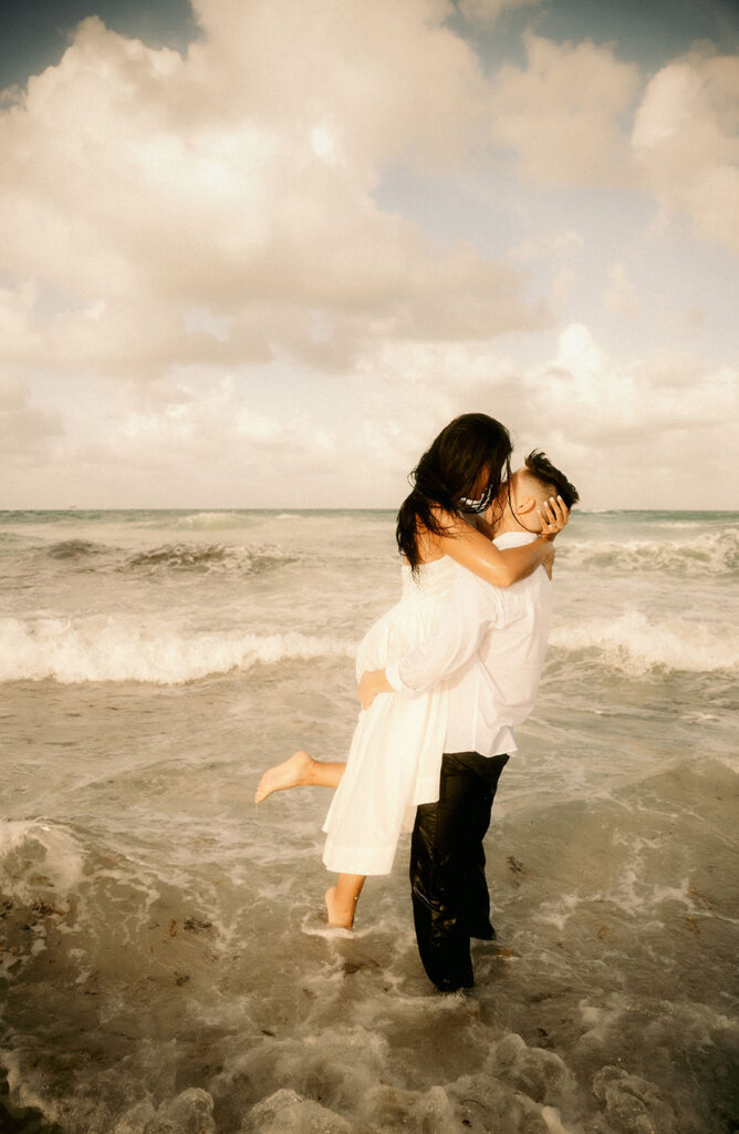 Couple Kiss Each other in South Beach