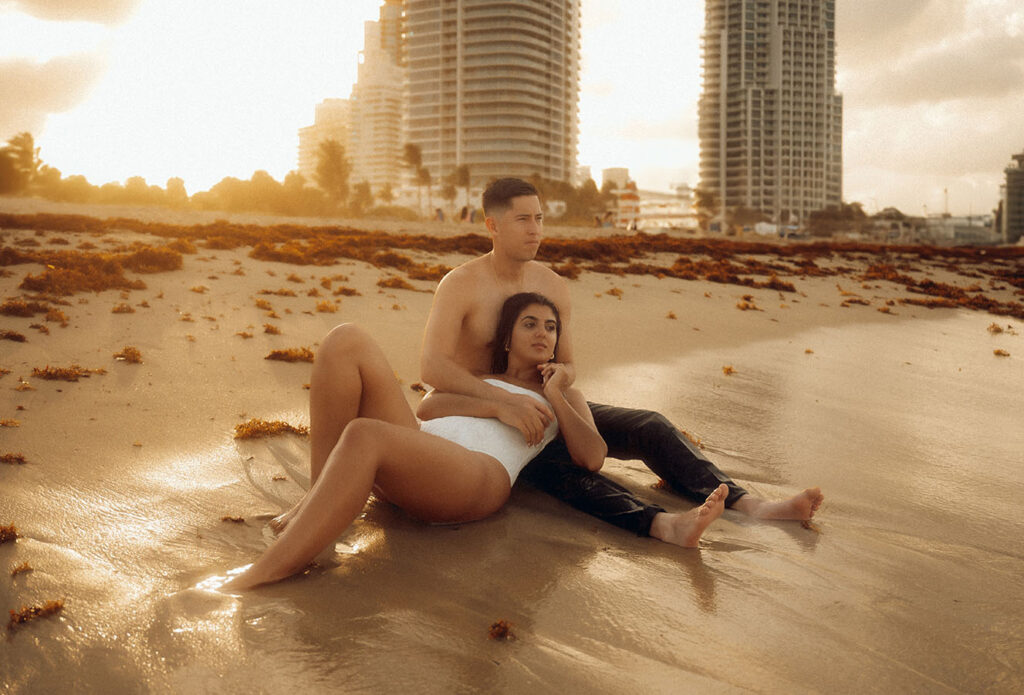 Couple lying down on South Point Beach