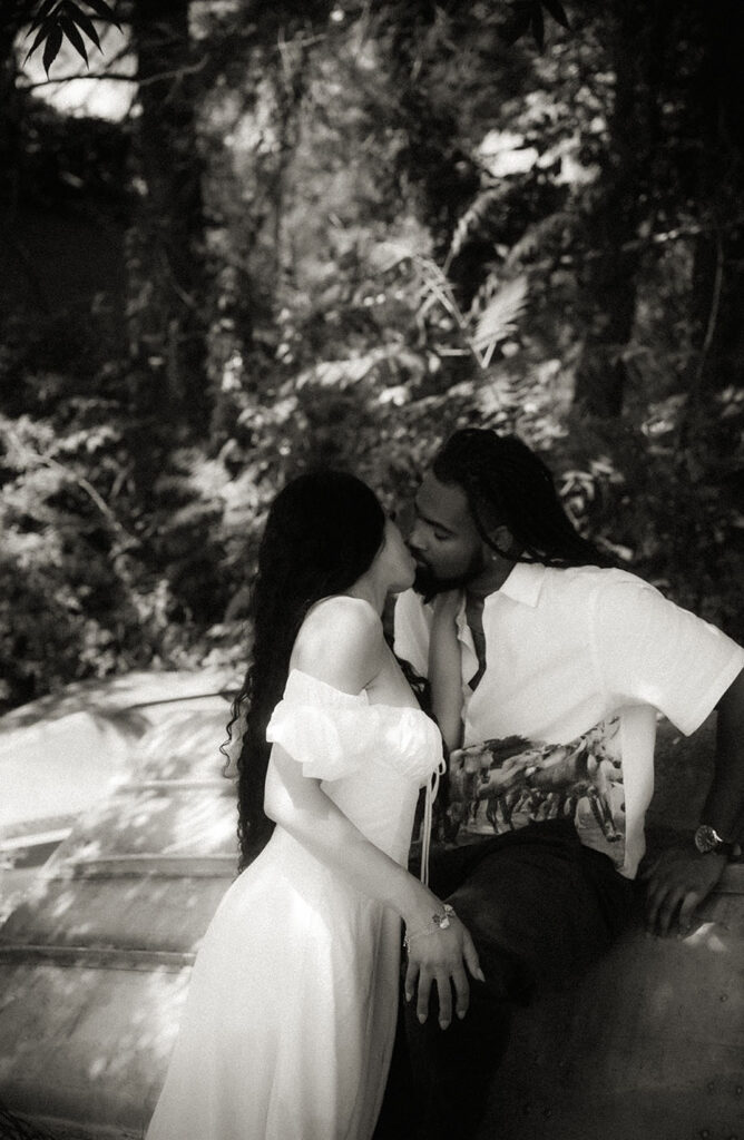 BW Couple kiss during engagement