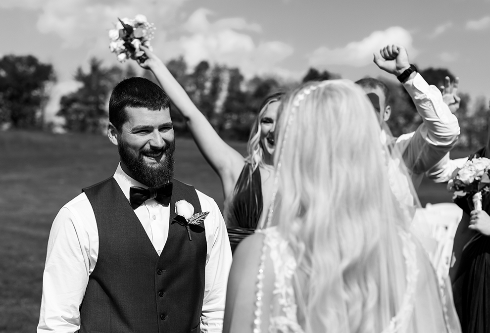 Groom looks at Bride during bridal photos