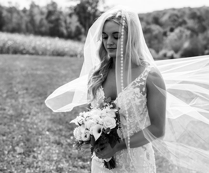 BW Documentary Photo of Bride Walking down the isle